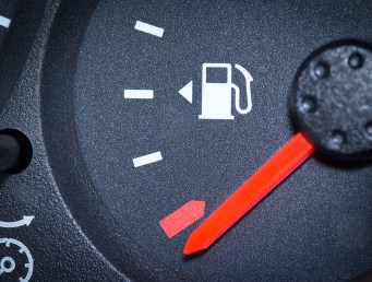 Car Fuel Gauge Showing Empty, Close Up