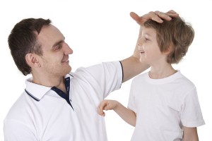 bigstock-Father-And-Son-Cheerfully-Talk-11604863