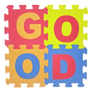 Word "Good" jigsaw puzzle pieces isolated on white