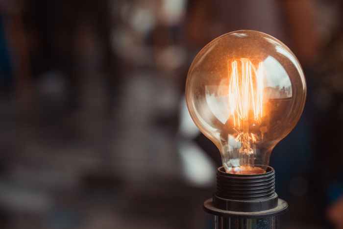 selective focus photography of turned on light bulb